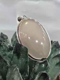Colgantes de plata con mineral. Cuarzo rosa grande