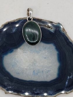 Colgantes de plata con mineral. Malaquita