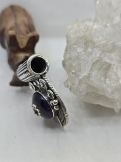 Colgantes de plata con mineral. Ónix labrado