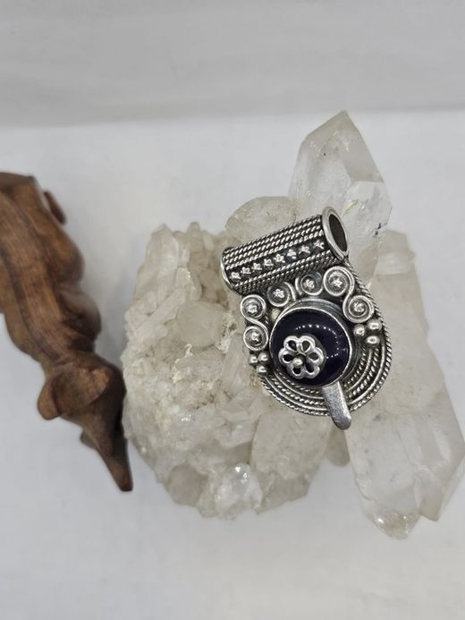 Colgantes de plata con mineral. Ónix labrado